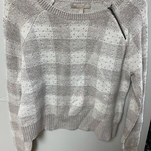 A crop top sweater. Grey and tan. Banana Republic is the brand. Size medium.